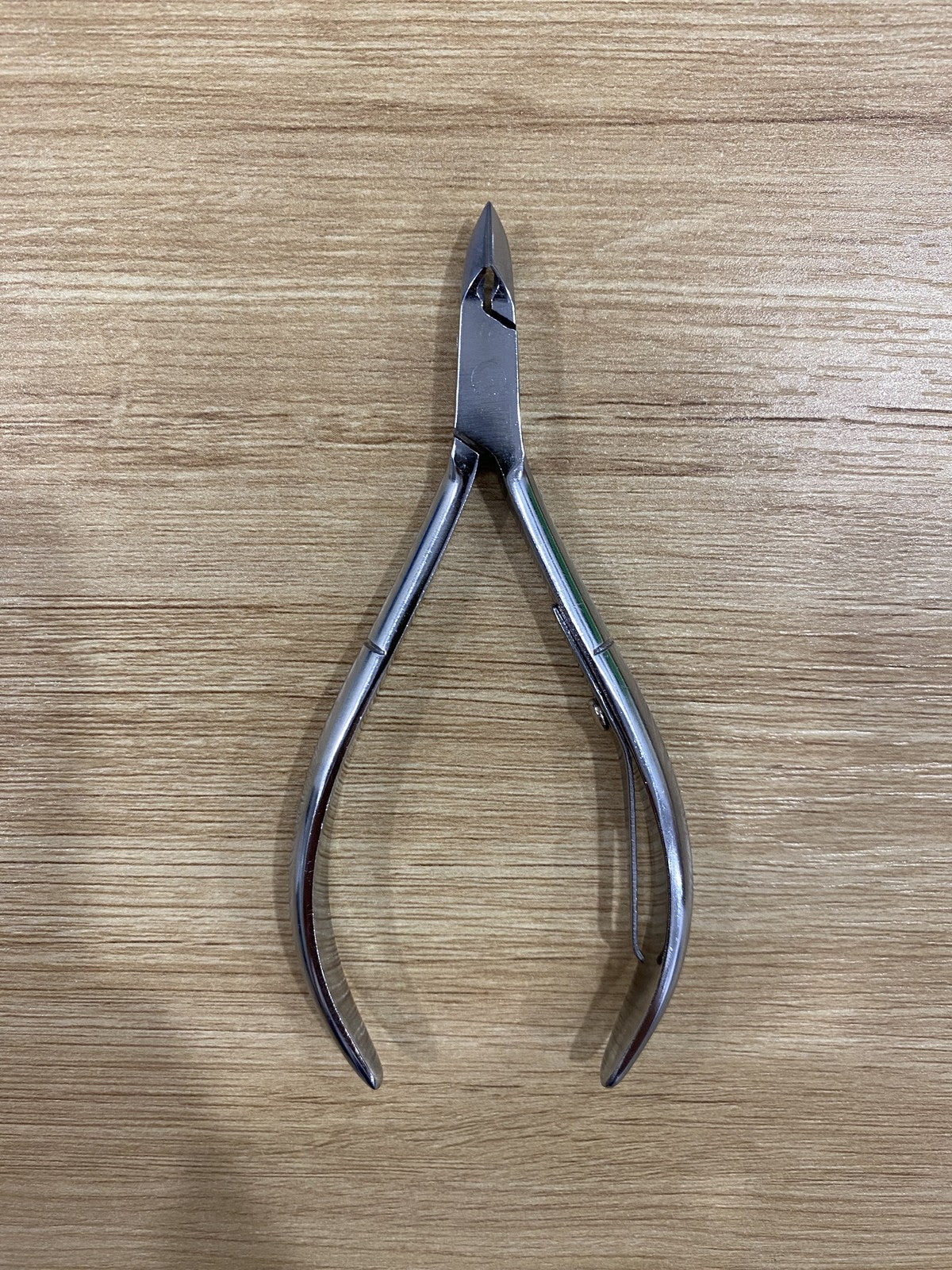 ElisNail square box joint cuticle nipper showing the hand-sharpened jaw and box joint
