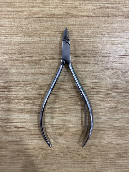 ElisNail square box joint cuticle nipper showing the hand-sharpened jaw and box joint